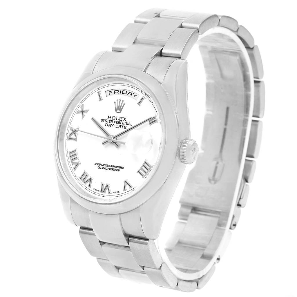This image shows a Rolex President 118209 Men's White Gold White Dial 118209 Men's White Gold White Dial Day-Date model watch at a three-quarter angle, highlighting the bracelet, face, and crown.