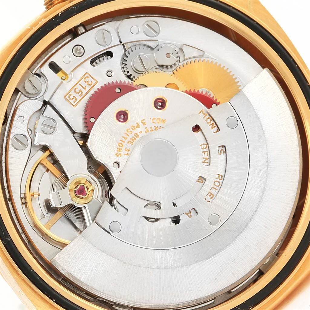 The image shows a close-up view of the movement and internal components of a Rolex President 18238 Men
s Yellow Gold White Dial 18238 Men
s Yellow Gold White Dial model watch.