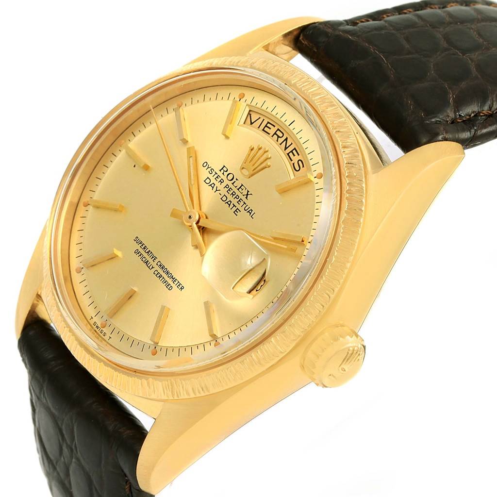 This image shows a side angle of a Rolex President 1807 Men
s Yellow Gold Champagne Dial 1807 Men
s Yellow Gold Champagne Dial model, highlighting the dial, bezel, and crown, as well as part of the leather strap.