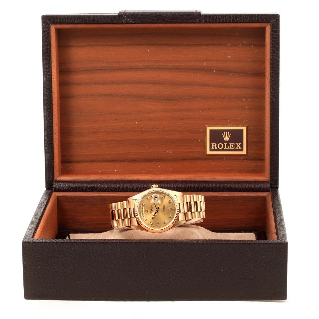 The image shows a Rolex President 18238 Men's Yellow Gold Champagne Dial 18238 Men's Yellow Gold Champagne Dial model watch displayed inside an open wooden Rolex box.