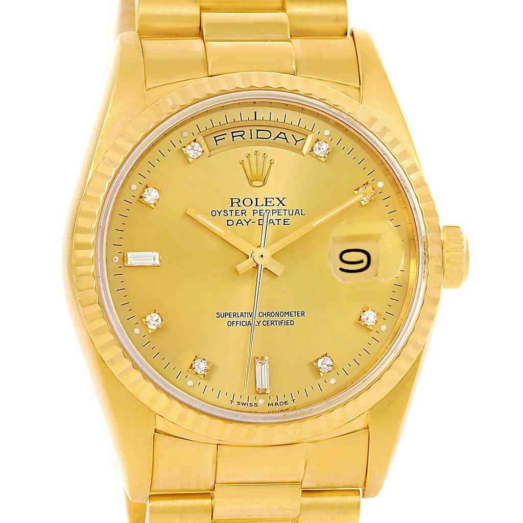 This image features a frontal view of a Rolex President 18238 Men's Yellow Gold Champagne Dial 18238 Men's Yellow Gold Champagne Dial model, showcasing the dial, bezel, day, and date indicators.