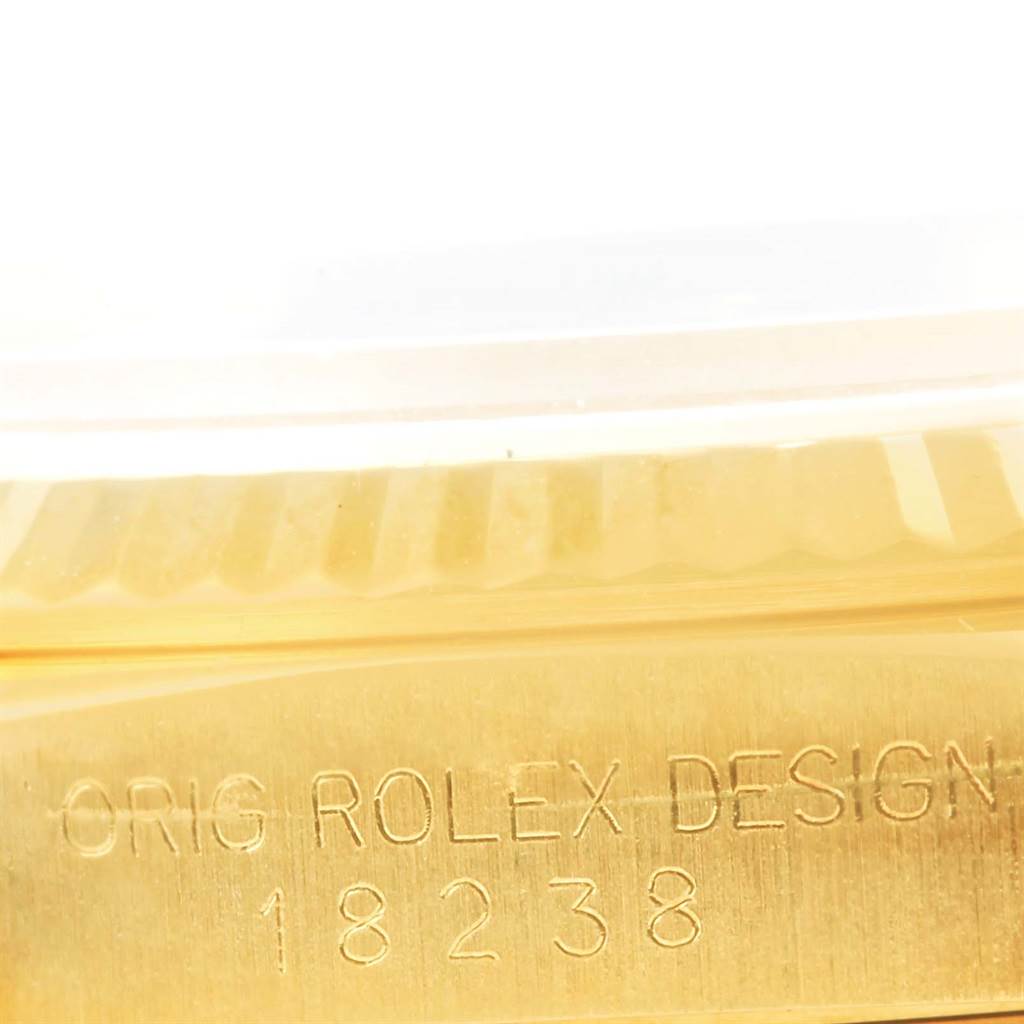 The image shows an angled close-up of the model number "18238" and "Orig Rolex Design" engraving on the Rolex President 18238 Men's Yellow Gold Champagne Dial 18238 Men's Yellow Gold Champagne Dial watch case.