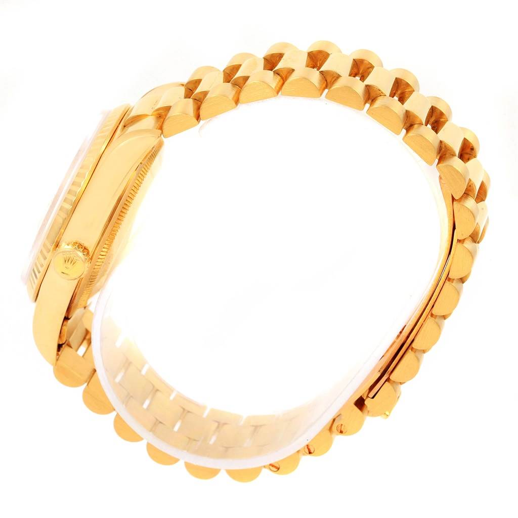 The image shows a Rolex President 18238 Men's Yellow Gold Champagne Dial 18238 Men's Yellow Gold Champagne Dial model watch from a side angle, highlighting the gold case and bracelet.