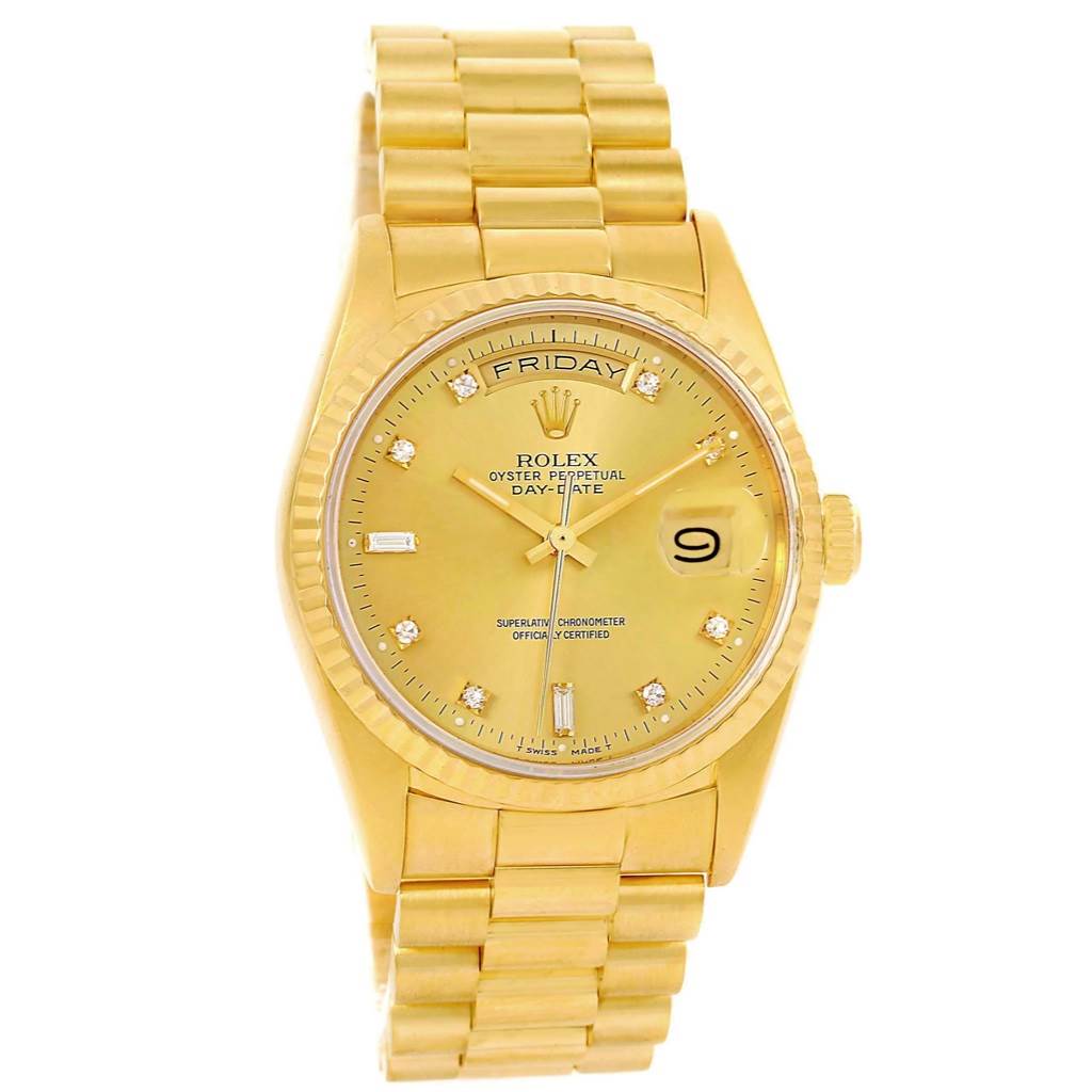 This image shows a Rolex President 18238 Men's Yellow Gold Champagne Dial 18238 Men's Yellow Gold Champagne Dial model watch, front view, displaying the dial, day-date function, and yellow gold bracelet.