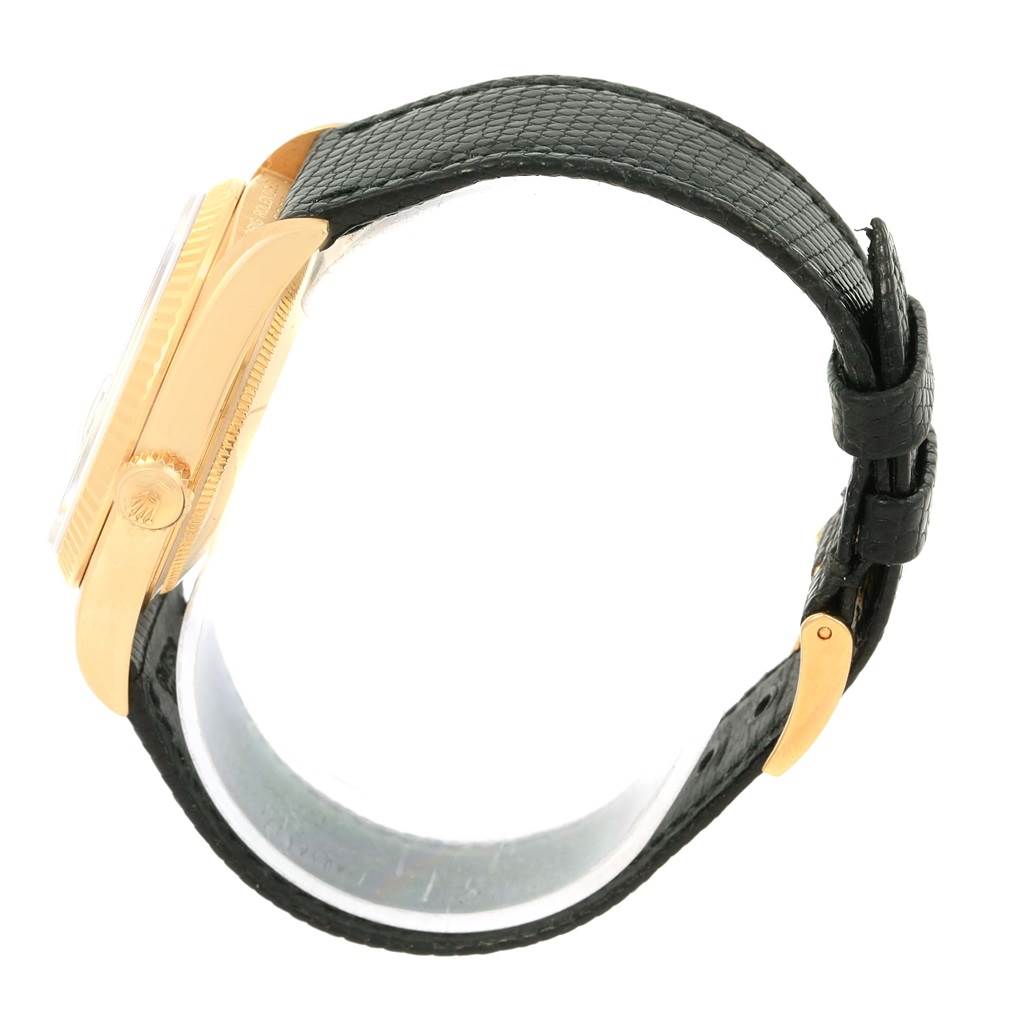 This image shows a side view of a Rolex President 15238 Men's Yellow Gold Black Dial 15238 Men's Yellow Gold Black Dial model watch, highlighting the crown and black leather strap.