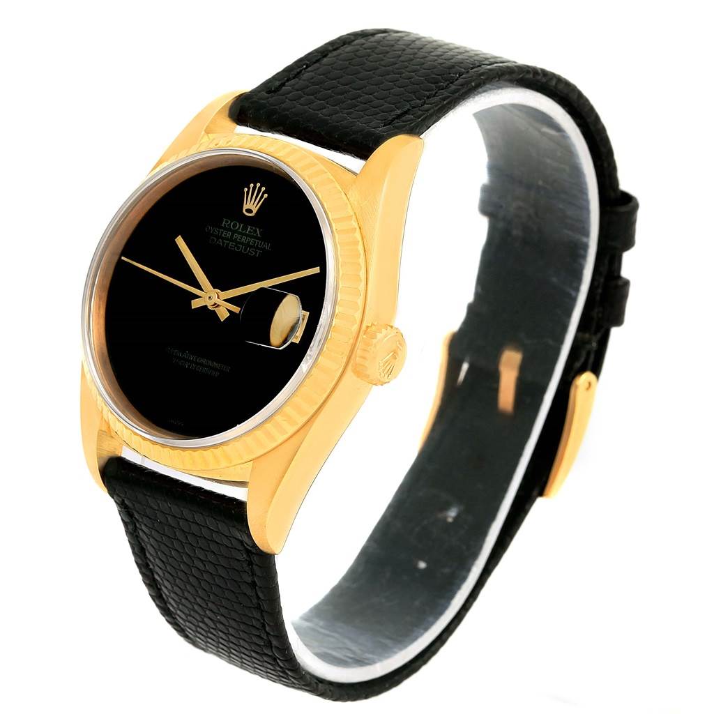 The image shows a Rolex President 15238 Men's Yellow Gold Black Dial 15238 Men's Yellow Gold Black Dial model watch at a tilted angle, highlighting the black dial, gold case, and black strap.