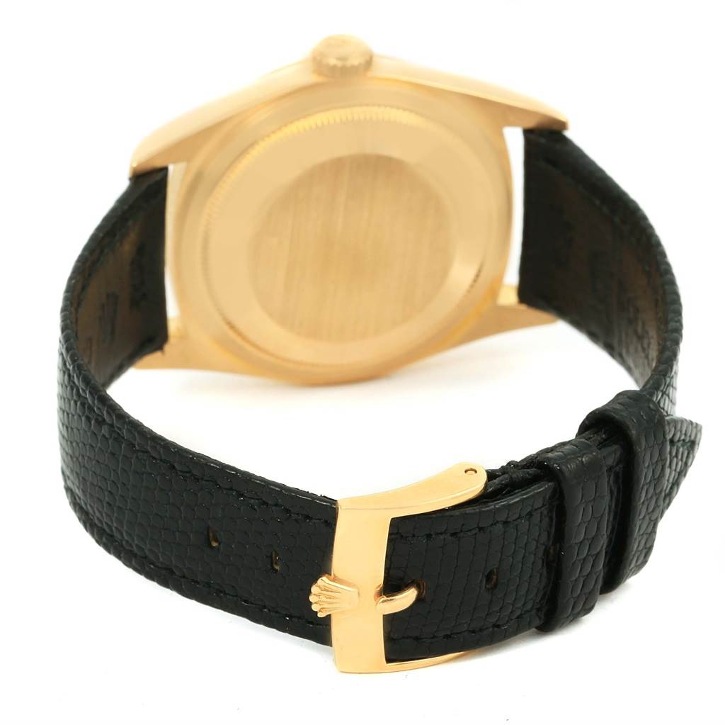 The image shows the back and side view of a Rolex President 15238 Men's Yellow Gold Black Dial 15238 Men's Yellow Gold Black Dial model, highlighting the case, leather strap, and buckle.