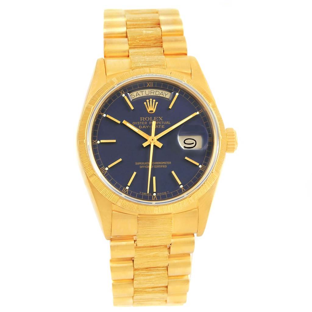 The President model Rolex watch is shown from a front angle, displaying the watch face, bracelet, and crown.