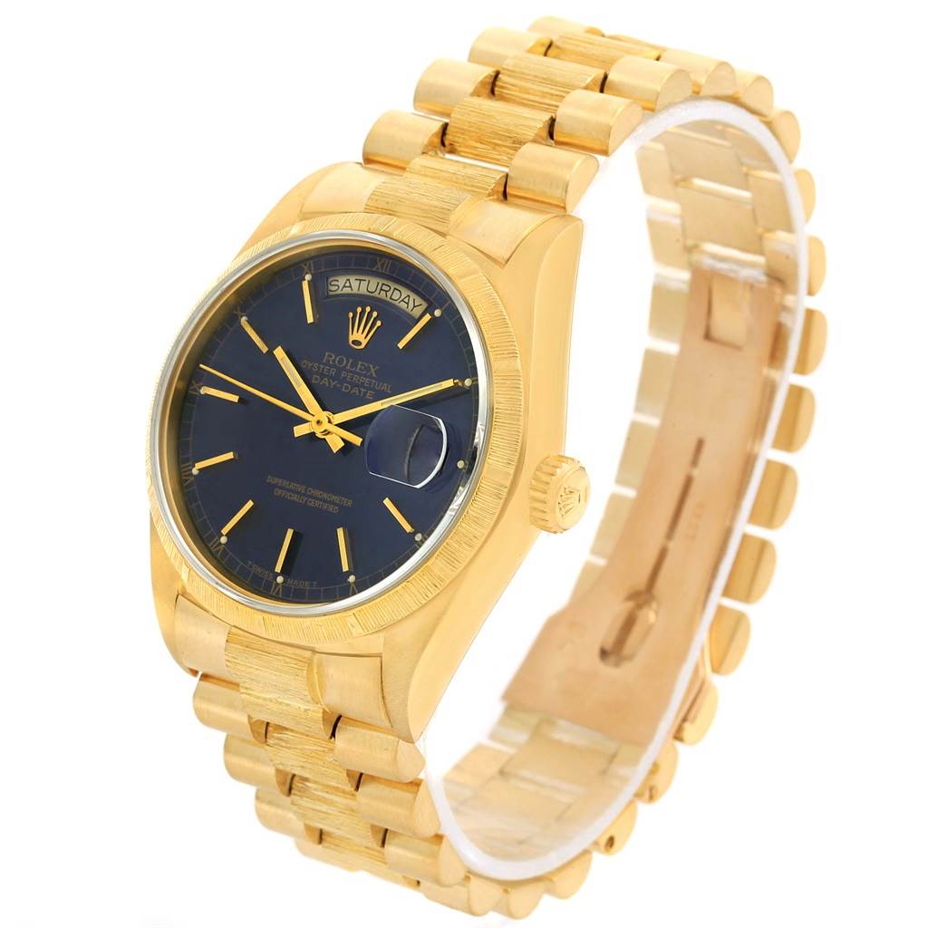 The image shows a Rolex President 18078 Men's Yellow Gold Blue Dial 18078 Men's Yellow Gold Blue Dial model watch from an angled view, highlighting the gold bracelet, case, and black dial.