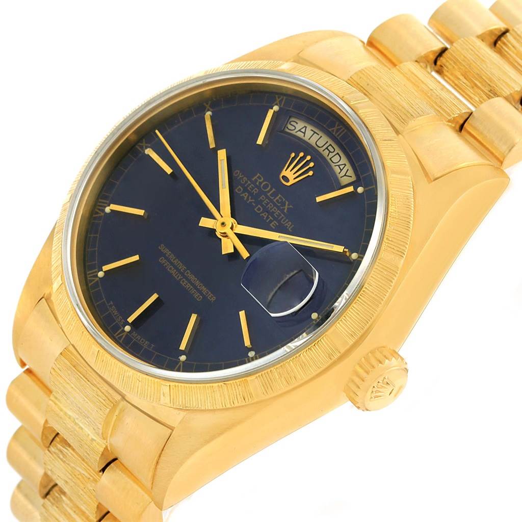 The image shows a Rolex President 18078 Men's Yellow Gold Blue Dial 18078 Men's Yellow Gold Blue Dial model from an angled perspective, highlighting the watch face, crown, and part of the bracelet.