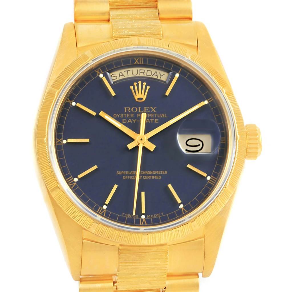 The image shows a front view of a Rolex President 18078 Men's Yellow Gold Blue Dial 18078 Men's Yellow Gold Blue Dial model watch, highlighting the face, bezel, crown, and part of the bracelet.