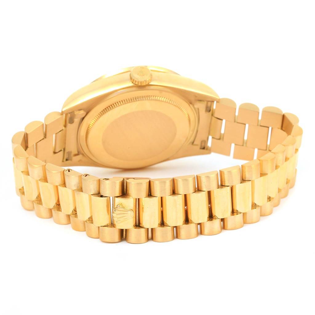 The image shows the backside and bracelet of a Rolex President 18038 Men's Yellow Gold Black Dial 18038 Men's Yellow Gold Black Dial model watch, focused on the clasp and case back.