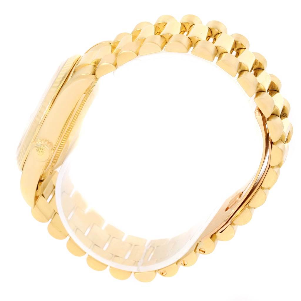 This image shows a side angle of a Rolex President 18238 Men's Yellow Gold Champagne Dial 18238 Men's Yellow Gold Champagne Dial model, highlighting the gold case and bracelet.