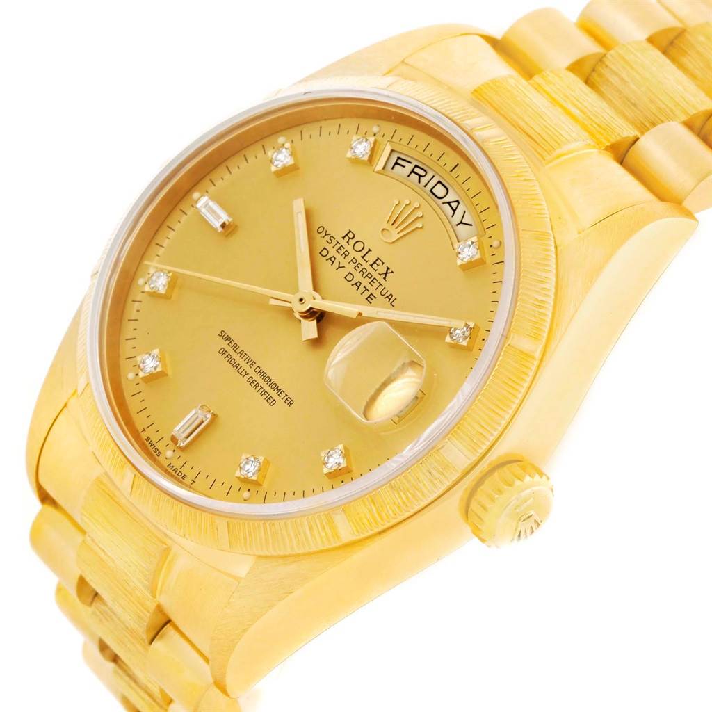 This image shows a side angle of a Rolex President 18078 Men's Yellow Gold Champagne Dial 18078 Men's Yellow Gold Champagne Dial model, highlighting its gold case, diamond markers, and day/date display.