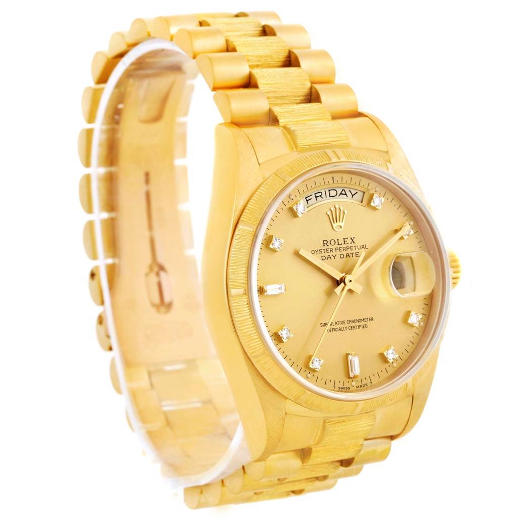 The Rolex President 18078 Men's Yellow Gold Champagne Dial 18078 Men's Yellow Gold Champagne Dial model watch is shown at a slight angle, displaying its gold band, round dial, and day-date feature.