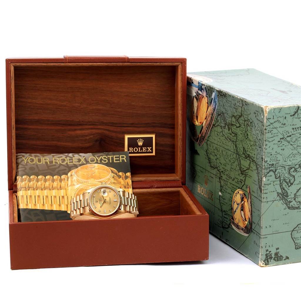 The image shows a Rolex President 18238 Men's Yellow Gold Champagne Dial 18238 Men's Yellow Gold Champagne Dial model watch in an open wooden box with its original packaging and documentation.