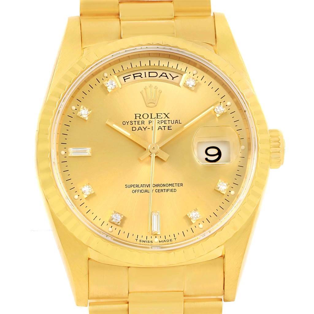 This image shows a frontal view of the Rolex President 18238 Men's Yellow Gold Champagne Dial 18238 Men's Yellow Gold Champagne Dial Day-Date watch, displaying its face, bracelet, and crown.