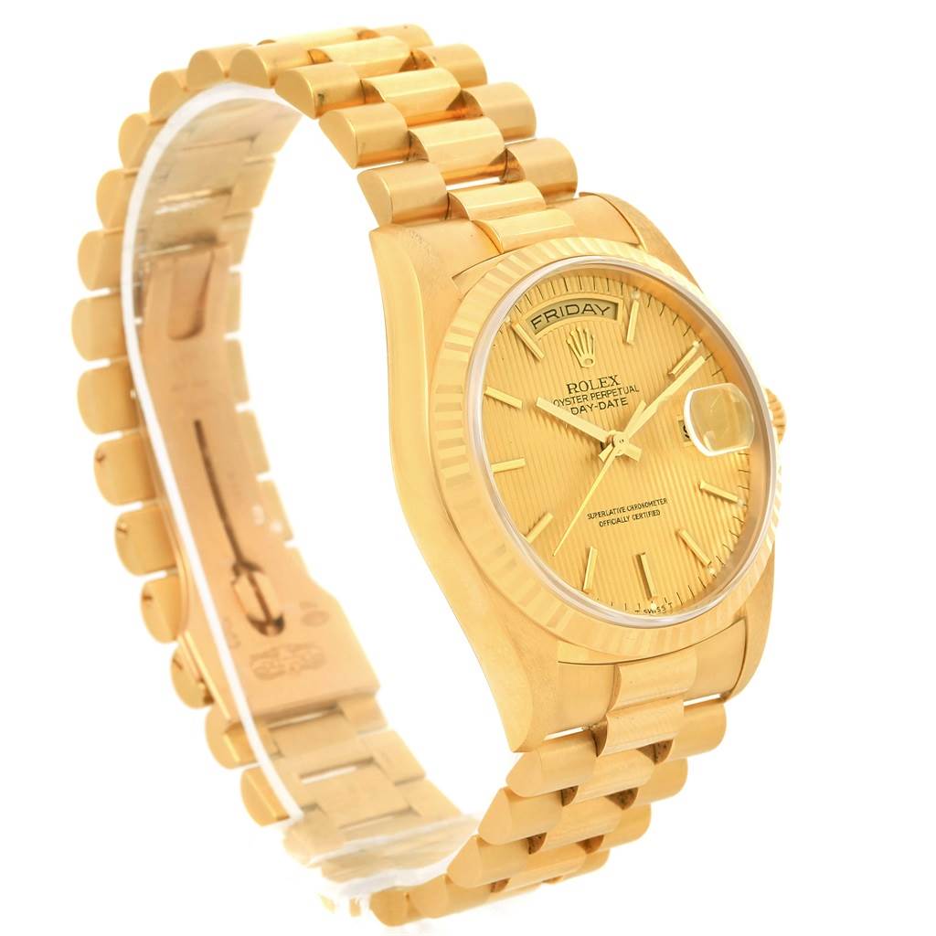 This image shows a side and partial front angle of the Rolex President 18238 Men's Yellow Gold Champagne Dial 18238 Men's Yellow Gold Champagne Dial model, highlighting its gold case, bracelet, and dial.