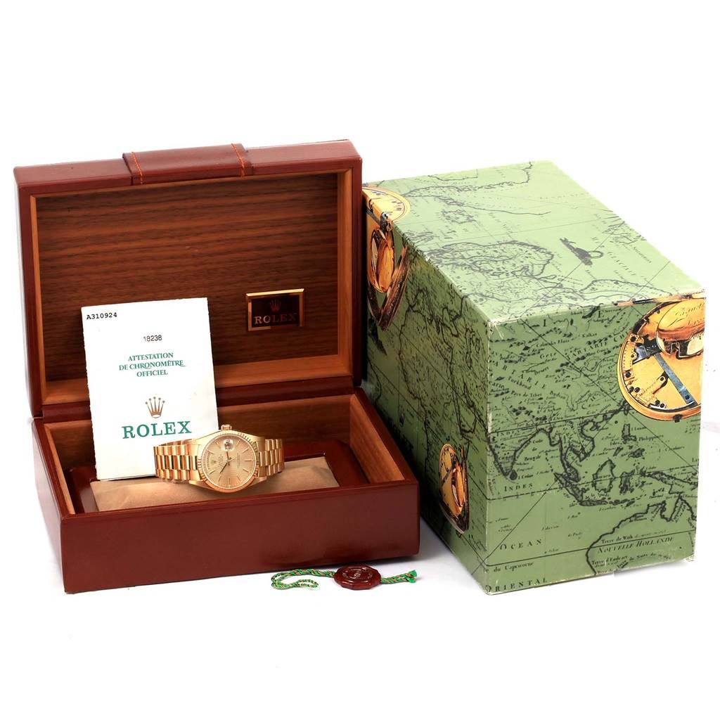 The image shows a Rolex President 18238 Men's Yellow Gold Champagne Dial 18238 Men's Yellow Gold Champagne Dial model watch in an open wooden box with certification and outer packaging.