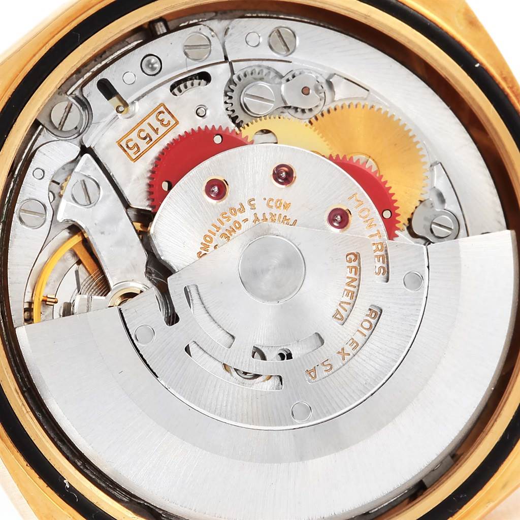 This image shows the inner mechanism of the Rolex President 18238 Men's Yellow Gold White Dial 18238 Men's Yellow Gold White Dial watch model from a close-up, rear angle.