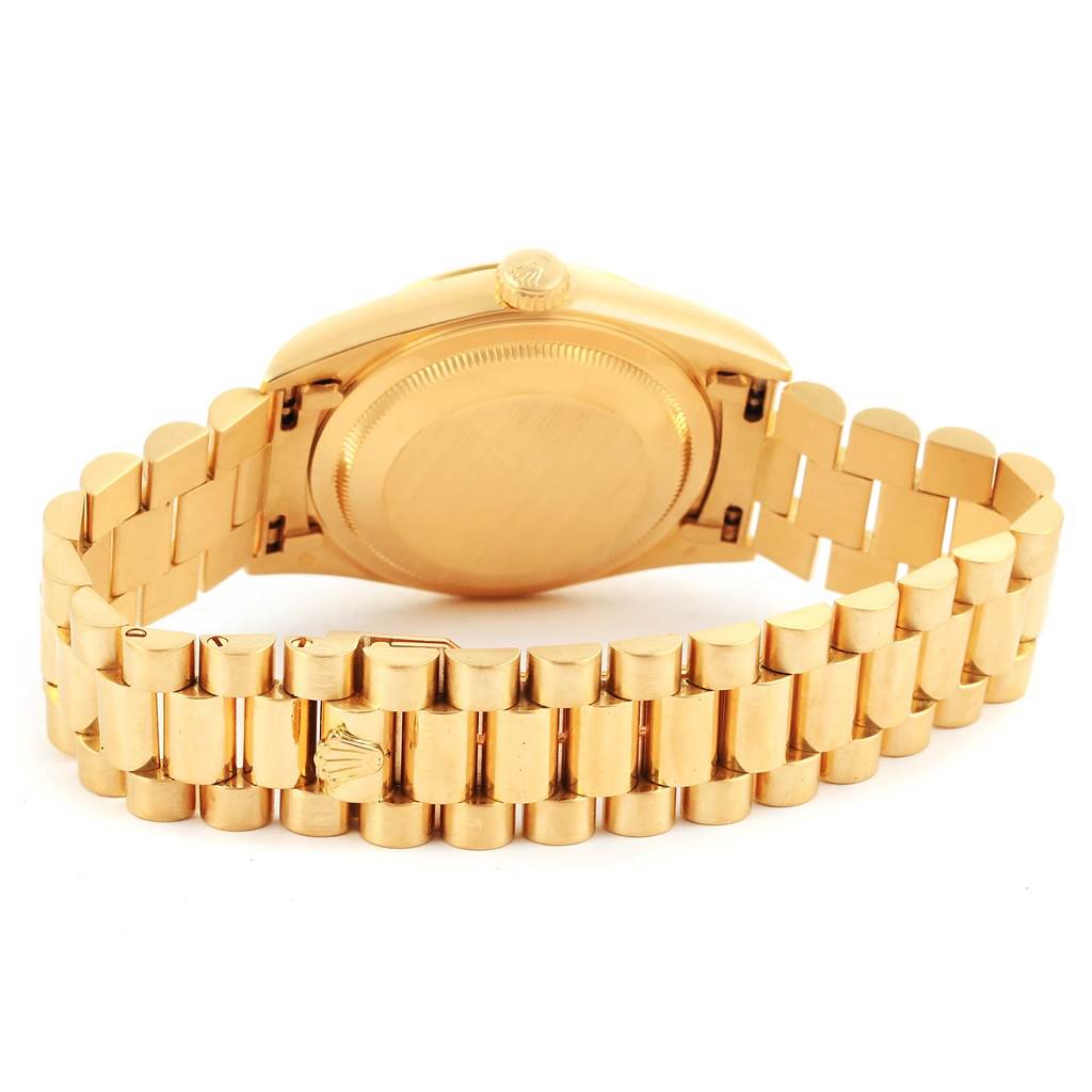 This image shows the back view of a Rolex President 18238 Men's Yellow Gold White Dial 18238 Men's Yellow Gold White Dial watch, focusing on the case back and bracelet.