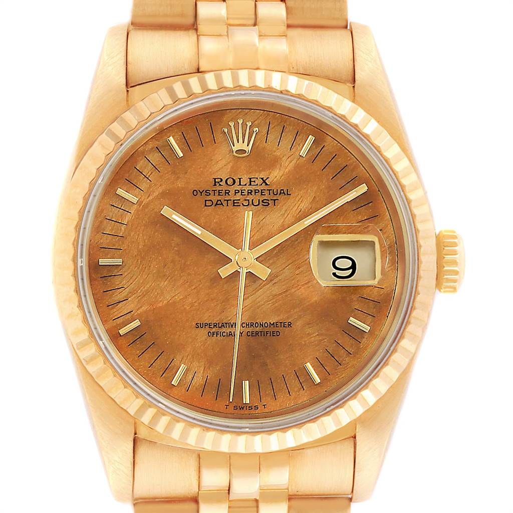 The Rolex President 16238 Men
s Yellow Gold Brown Dial 16238 Men
s Yellow Gold Brown Dial model watch is shown from the front, displaying its face, day, date, and a portion of the band.