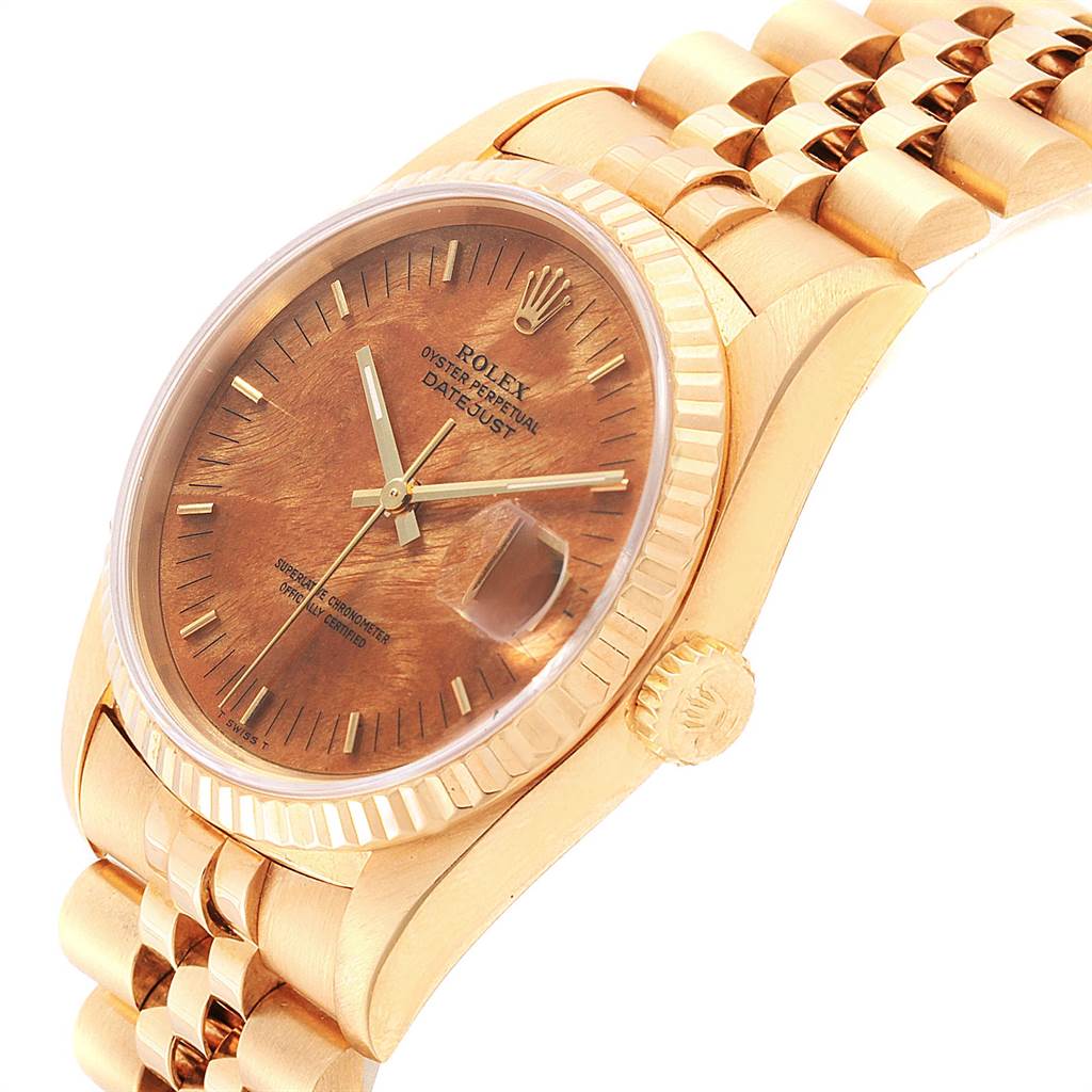 The image shows a Rolex President 16238 Men
s Yellow Gold Brown Dial 16238 Men
s Yellow Gold Brown Dial model watch from an angled side view, highlighting its crown, bezel, dial, and bracelet.