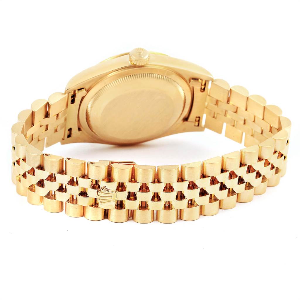This image shows the back and bracelet of a Rolex President 16238 Men
s Yellow Gold Brown Dial 16238 Men
s Yellow Gold Brown Dial model watch.