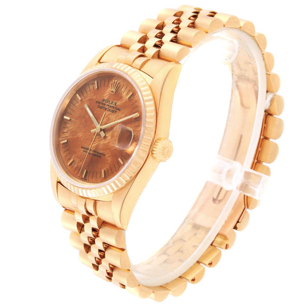 The image shows a Rolex President 16238 Men
s Yellow Gold Brown Dial 16238 Men
s Yellow Gold Brown Dial model watch from a three-quarter angle, highlighting its face, bezel, crown, and bracelet.