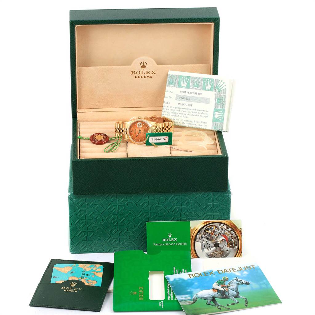 The image shows a Rolex President 16238 Men
s Yellow Gold Brown Dial 16238 Men
s Yellow Gold Brown Dial model watch in its open box, accompanied by Best Quality
ation papers and booklets displayed around it.