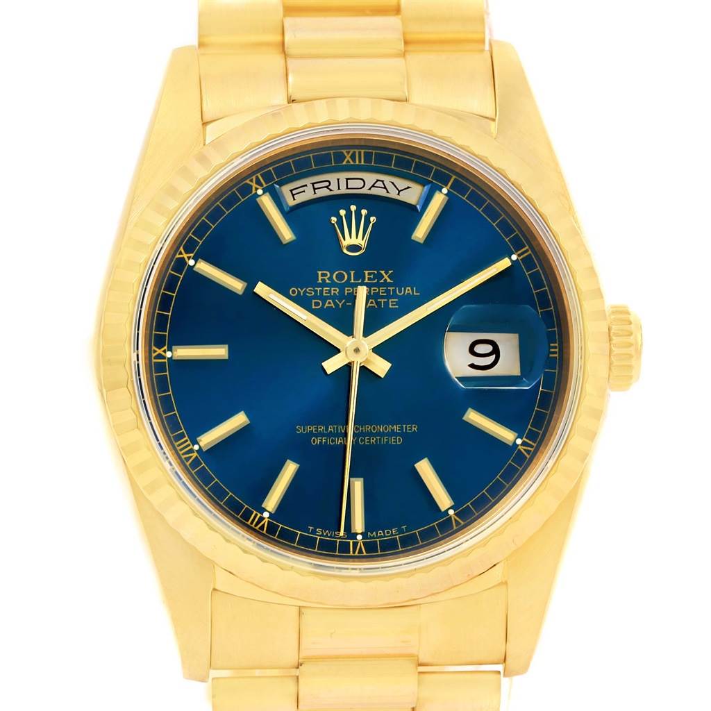 The image shows the face, bezel, and part of the bracelet of a Rolex President 18238 Men's Yellow Gold Blue Dial 18238 Men's Yellow Gold Blue Dial model watch.