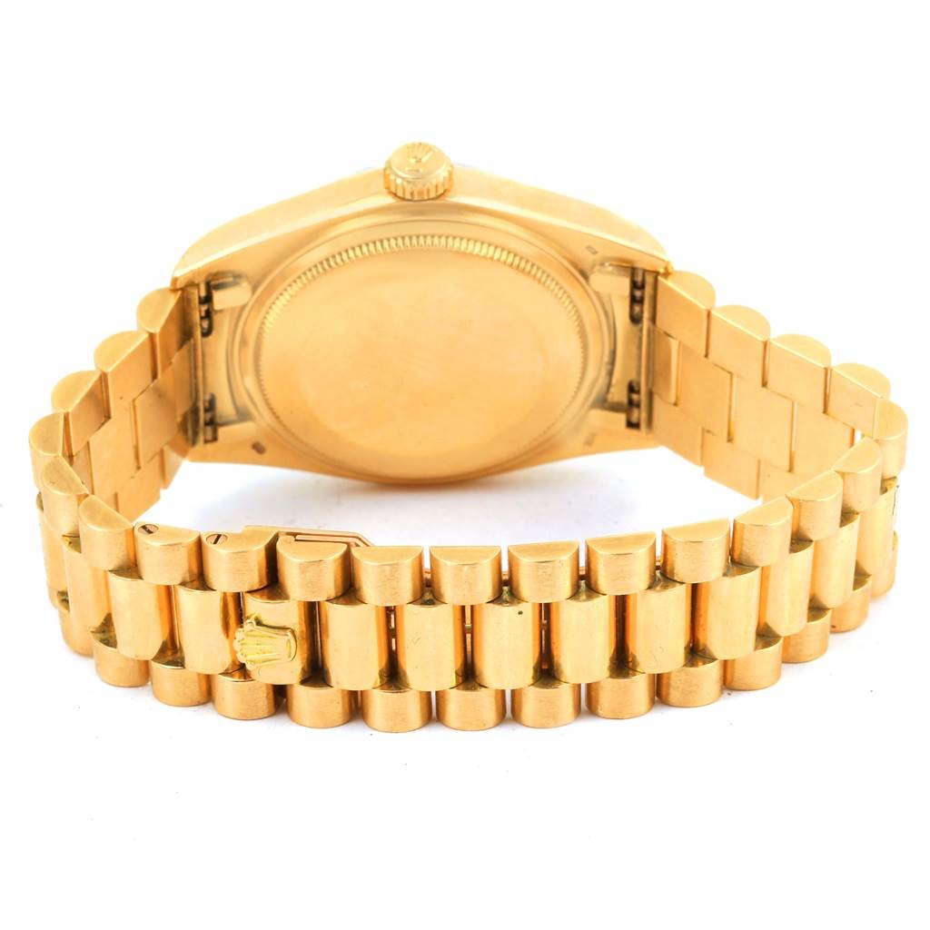 The image shows the back view of a gold Rolex President 1803 Men's Yellow Gold White Dial 1803 Men's Yellow Gold White Dial watch, displaying the case back and bracelet.