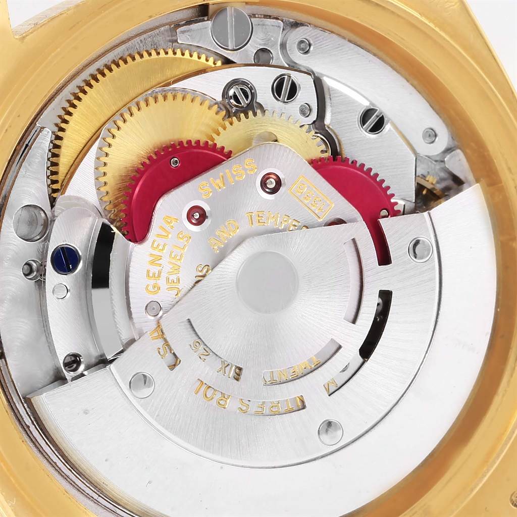 The image shows the intricate inner workings and gears of the Rolex President 1803 Men's Yellow Gold White Dial 1803 Men's Yellow Gold White Dial model watch from an angled close-up view.
