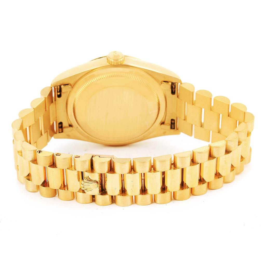 This image shows the back view of a Rolex President 18238 Men's Yellow Gold White Dial 18238 Men's Yellow Gold White Dial model watch, highlighting the case back and bracelet.