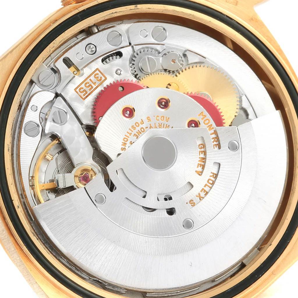 The image shows an internal close-up of the Rolex President 18238 Men's Yellow Gold Champagne Dial 18238 Men's Yellow Gold Champagne Dial watch movement and intricate parts from a top-down angle.