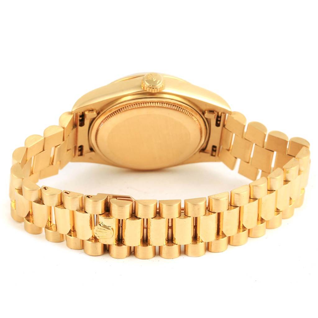 This image shows the back and bracelet of the Rolex President 18038 Men's Yellow Gold Champagne Dial 18038 Men's Yellow Gold Champagne Dial model watch in a gold finish.