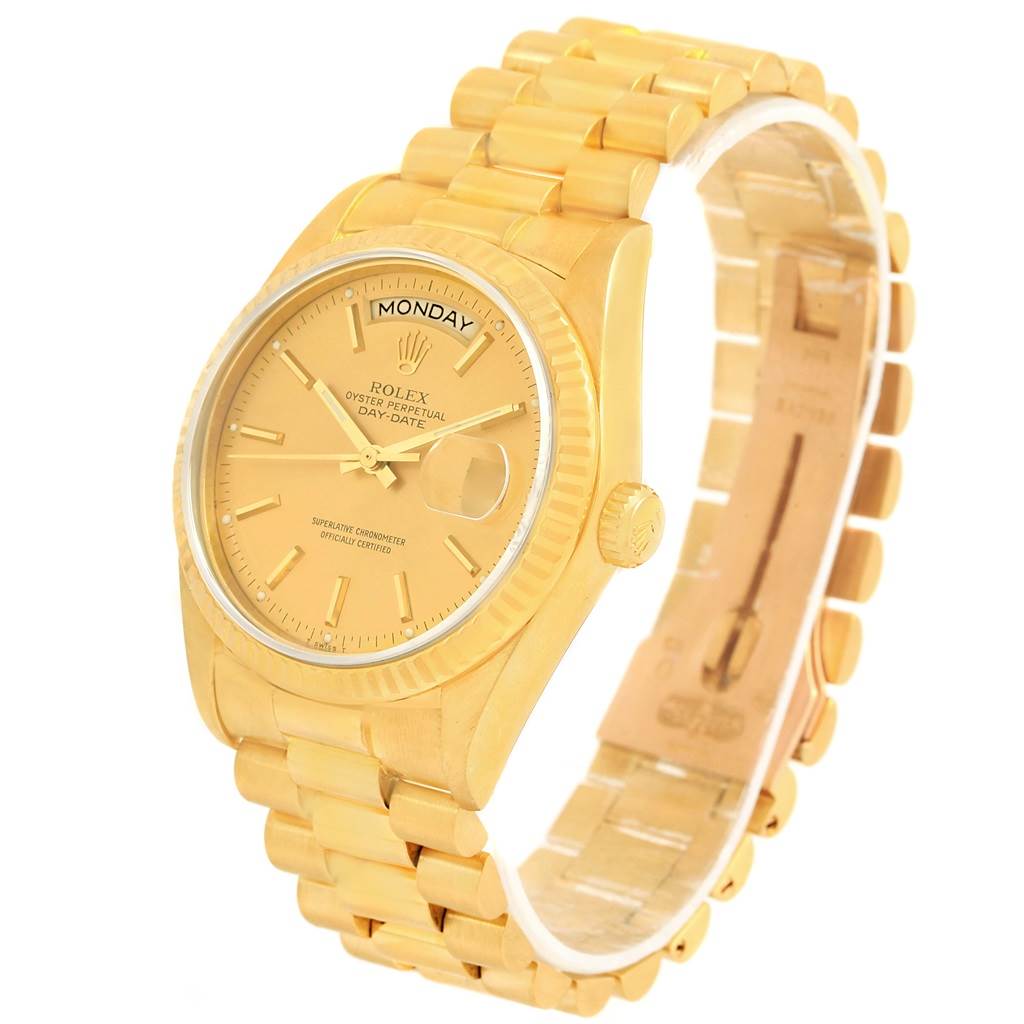 This image shows a gold Rolex President 18038 Men's Yellow Gold Champagne Dial 18038 Men's Yellow Gold Champagne Dial watch at a three-quarter view angle, highlighting its bracelet, dial, and crown.