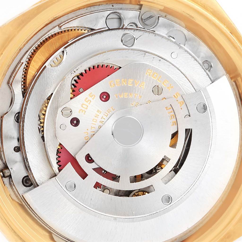 The image shows an internal view of the Rolex President 18038 Men's Yellow Gold Champagne Dial 18038 Men's Yellow Gold Champagne Dial watch, specifically its intricate movement mechanism.