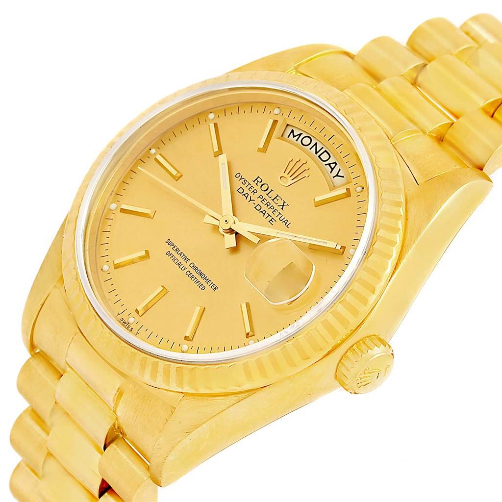 This image shows a close-up, angled view of the dial and part of the bracelet of a Rolex President 18038 Men's Yellow Gold Champagne Dial 18038 Men's Yellow Gold Champagne Dial model watch.