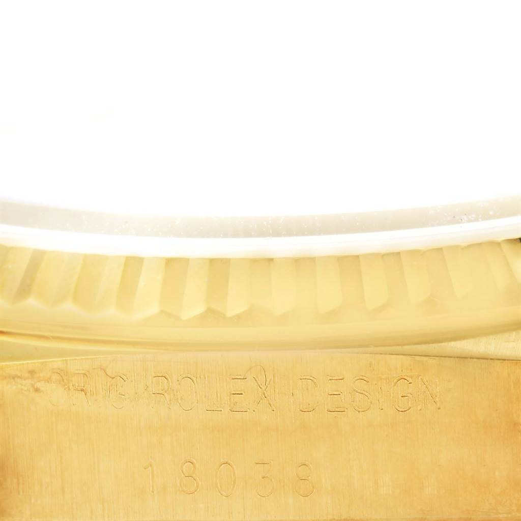 This close-up image shows the side of the bezel and the case with the model number of the Rolex President 18038 Men's Yellow Gold Champagne Dial 18038 Men's Yellow Gold Champagne Dial watch.