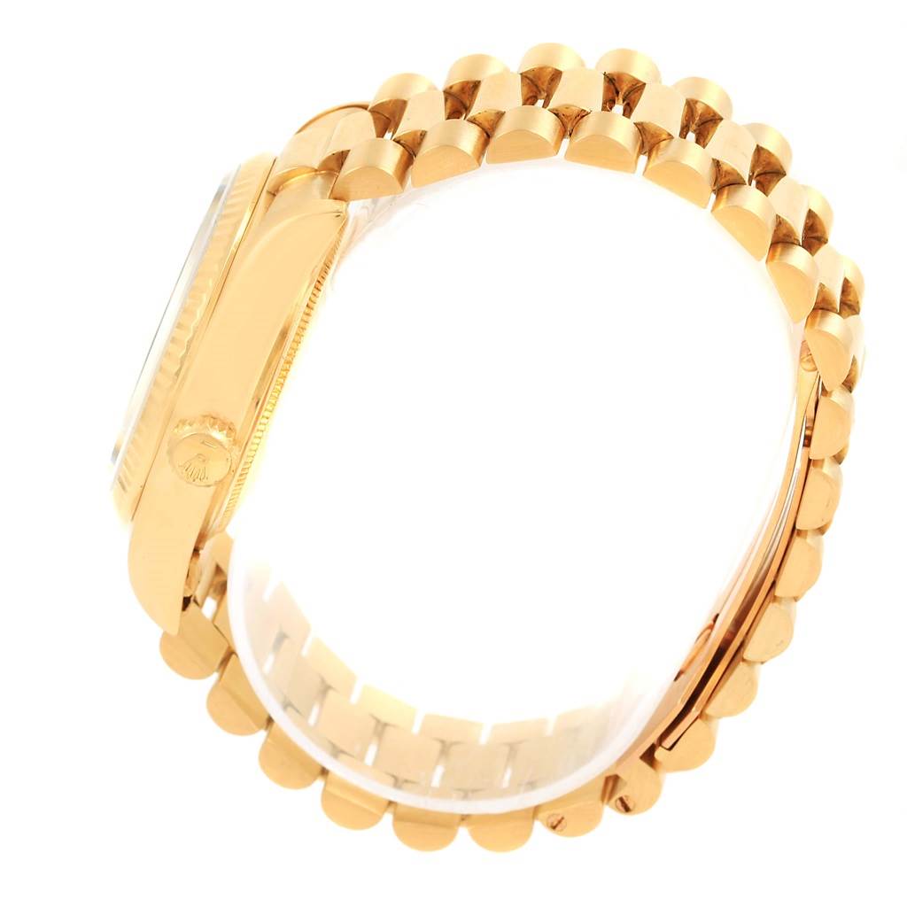 The image shows a side view of a Rolex President 18038 Men's Yellow Gold Champagne Dial 18038 Men's Yellow Gold Champagne Dial model watch, highlighting its gold case and bracelet.