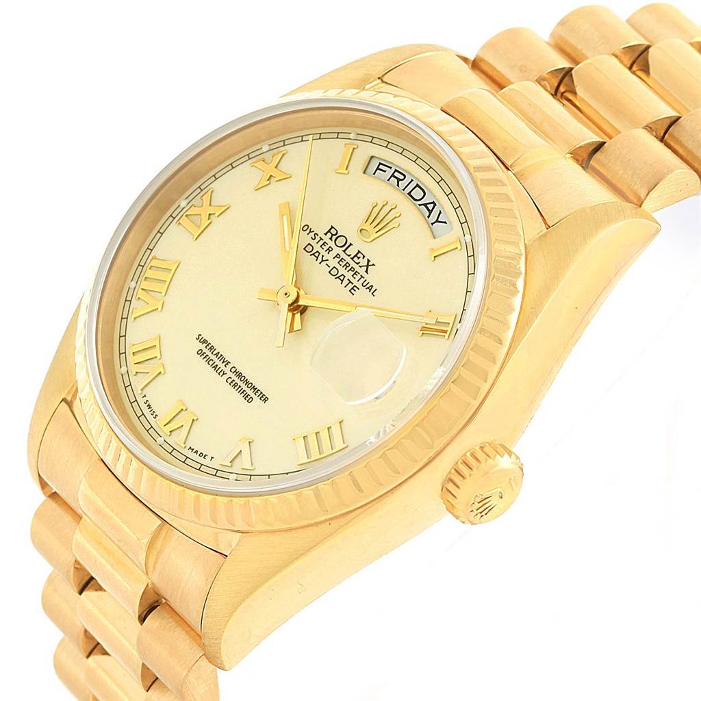 This image shows a Rolex President 18038 Men
s Yellow Gold Beige Dial 18038 Men
s Yellow Gold Beige Dial model watch from a front angle, highlighting the dial, crown, and part of the bracelet.