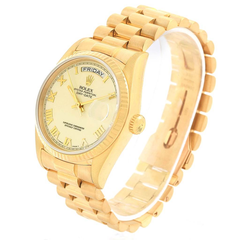 The Rolex President 18038 Men
s Yellow Gold Beige Dial 18038 Men
s Yellow Gold Beige Dial model watch is shown from an angled top view, displaying its face, bezel, crown, and bracelet.