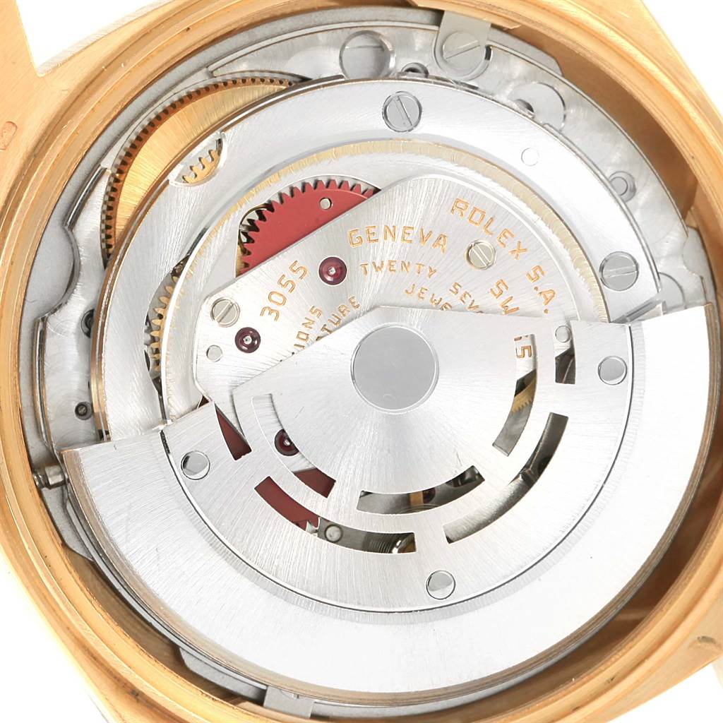 This image shows the movement mechanism of a Rolex President 18038 Men
s Yellow Gold Beige Dial 18038 Men
s Yellow Gold Beige Dial model watch from a close-up angle.