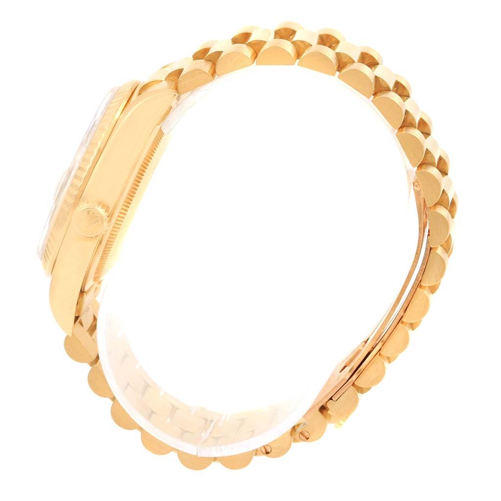 The image shows a side profile of the Rolex President 18238 Men's Yellow Gold Champagne Dial 18238 Men's Yellow Gold Champagne Dial model watch, highlighting its gold band and case.