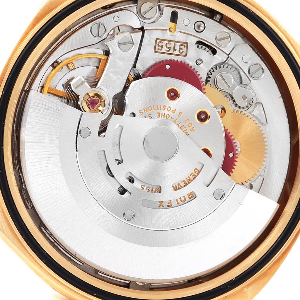 The image shows a close-up view of the movement mechanism of a Rolex President 18238 Men's Yellow Gold Champagne Dial 18238 Men's Yellow Gold Champagne Dial model watch.
