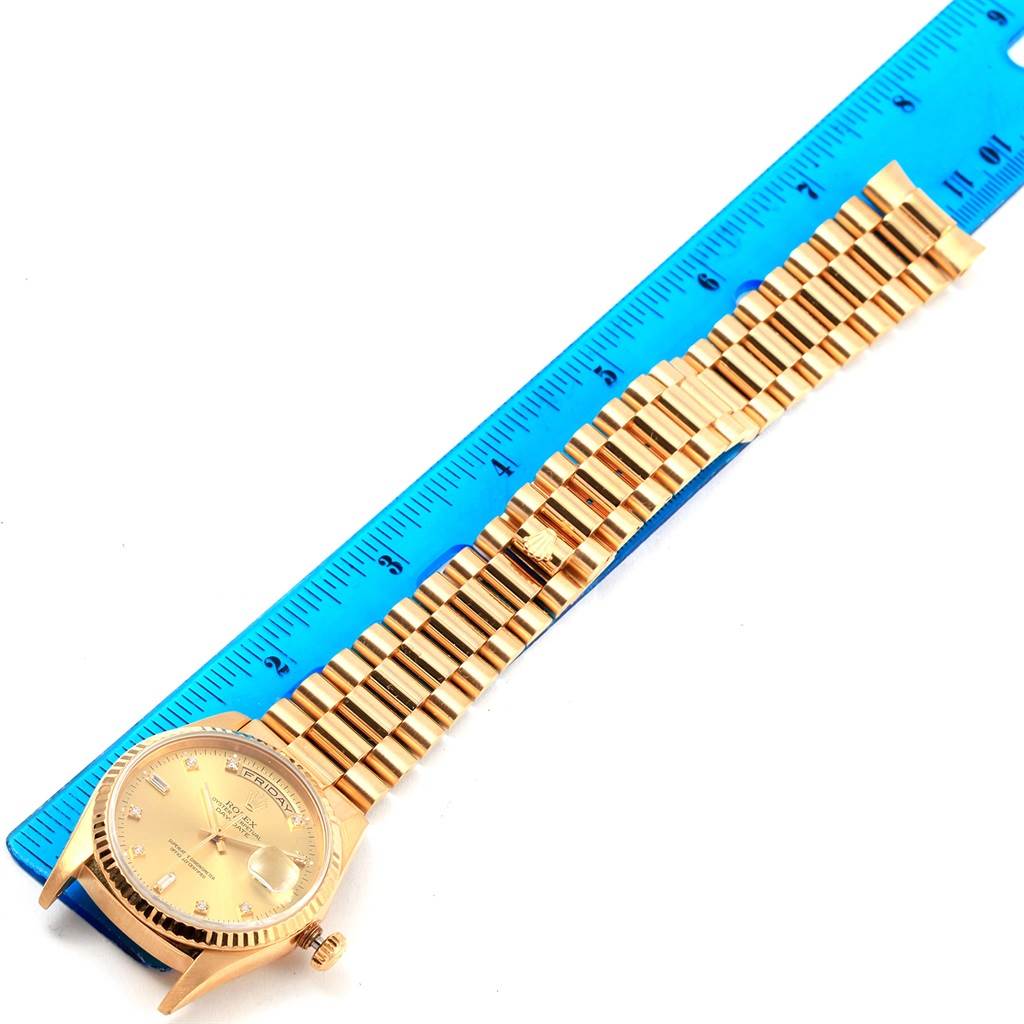 The image shows the full Rolex President 18238 Men's Yellow Gold Champagne Dial 18238 Men's Yellow Gold Champagne Dial watch and band at an overhead angle, alongside a blue ruler for scale.