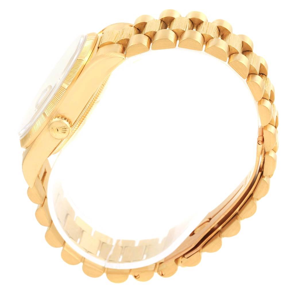 This image shows a side view of the Rolex President 18248 Men's Yellow Gold Champagne Dial 18248 Men's Yellow Gold Champagne Dial model watch, focusing on the band and case.