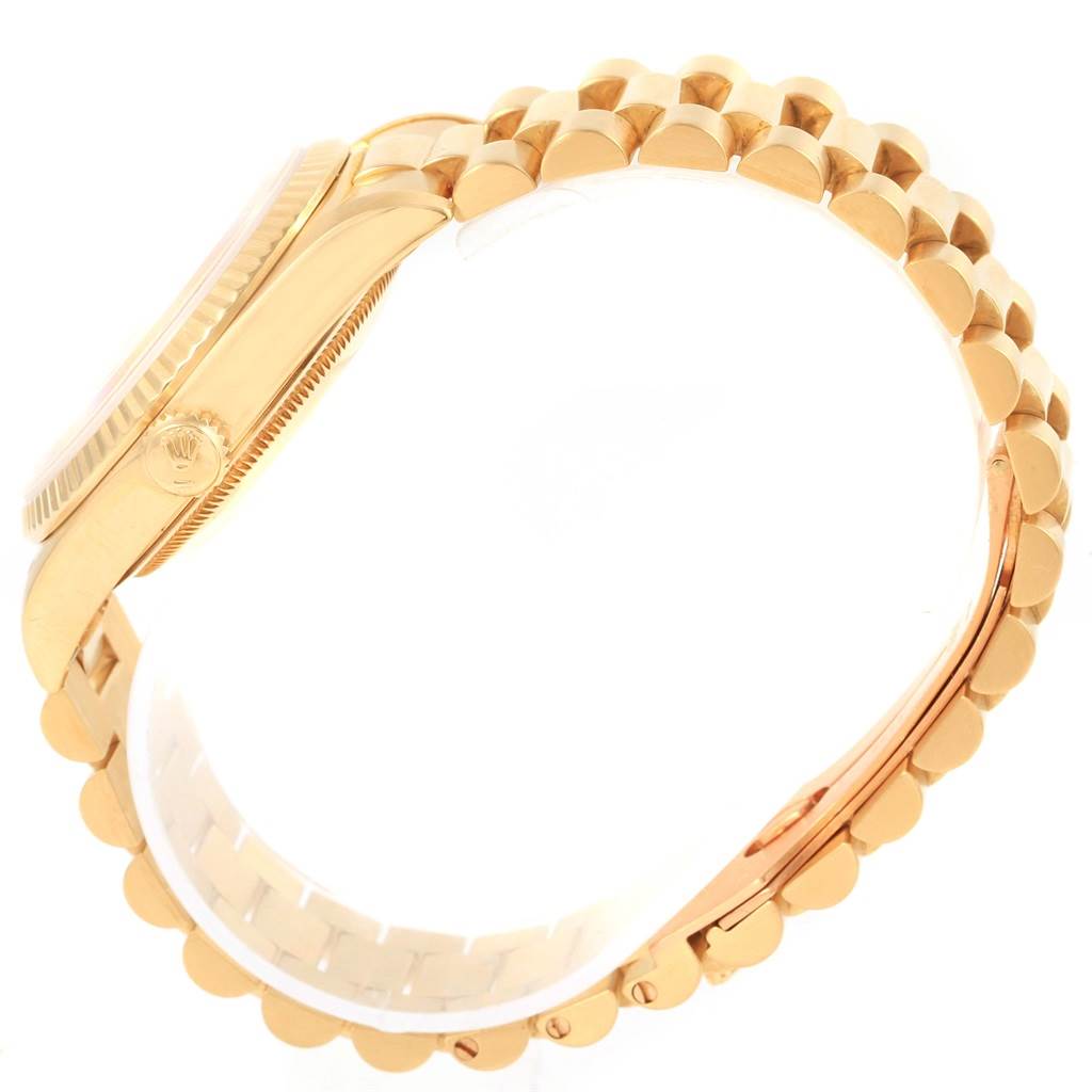 This image shows a side view of the Rolex President 18238 Men's Yellow Gold Champagne Dial 18238 Men's Yellow Gold Champagne Dial model watch, focusing on the case, bezel, and bracelet.