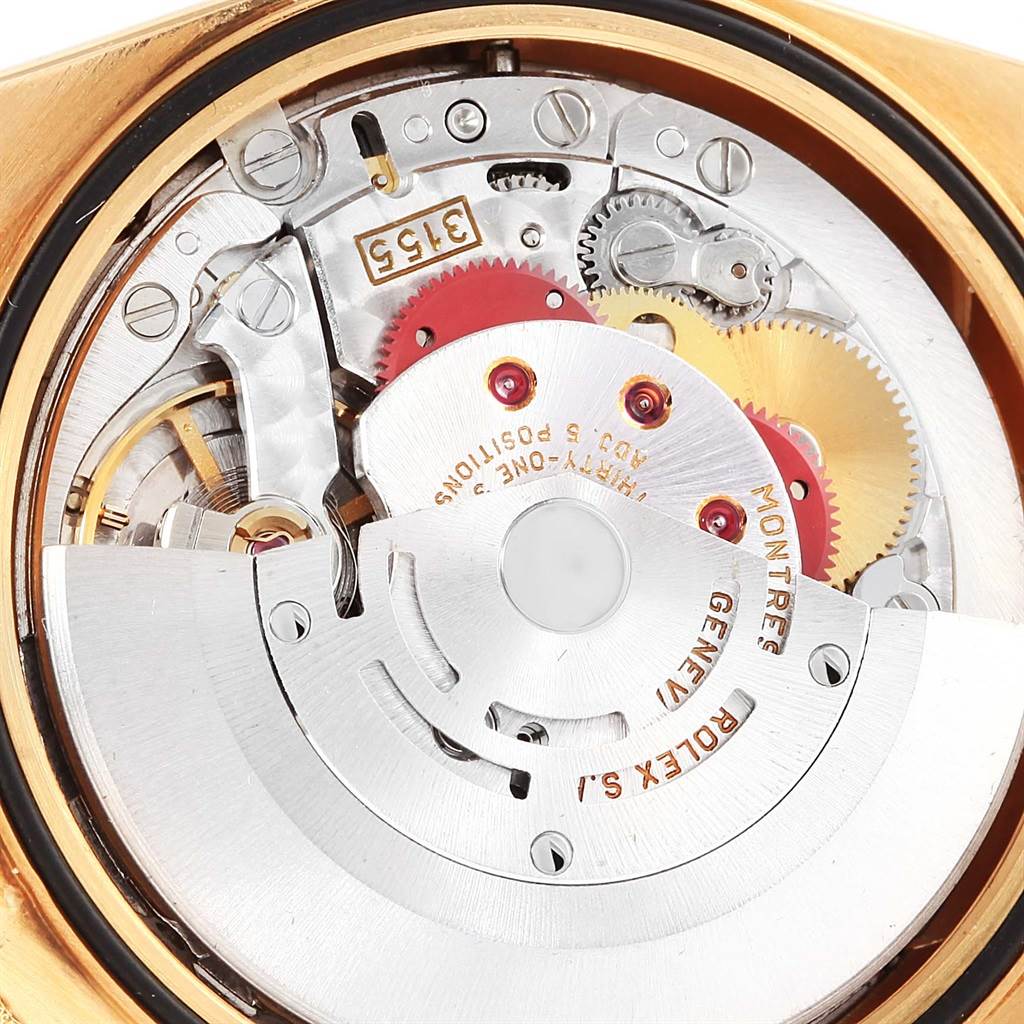 The image shows a close-up of the Rolex President 18238 Men's Yellow Gold Champagne Dial 18238 Men's Yellow Gold Champagne Dial model's movement and inner components from the back angle.
